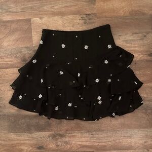 Daisy Print Black Mini Ruffled Skirt Urban Outfitters